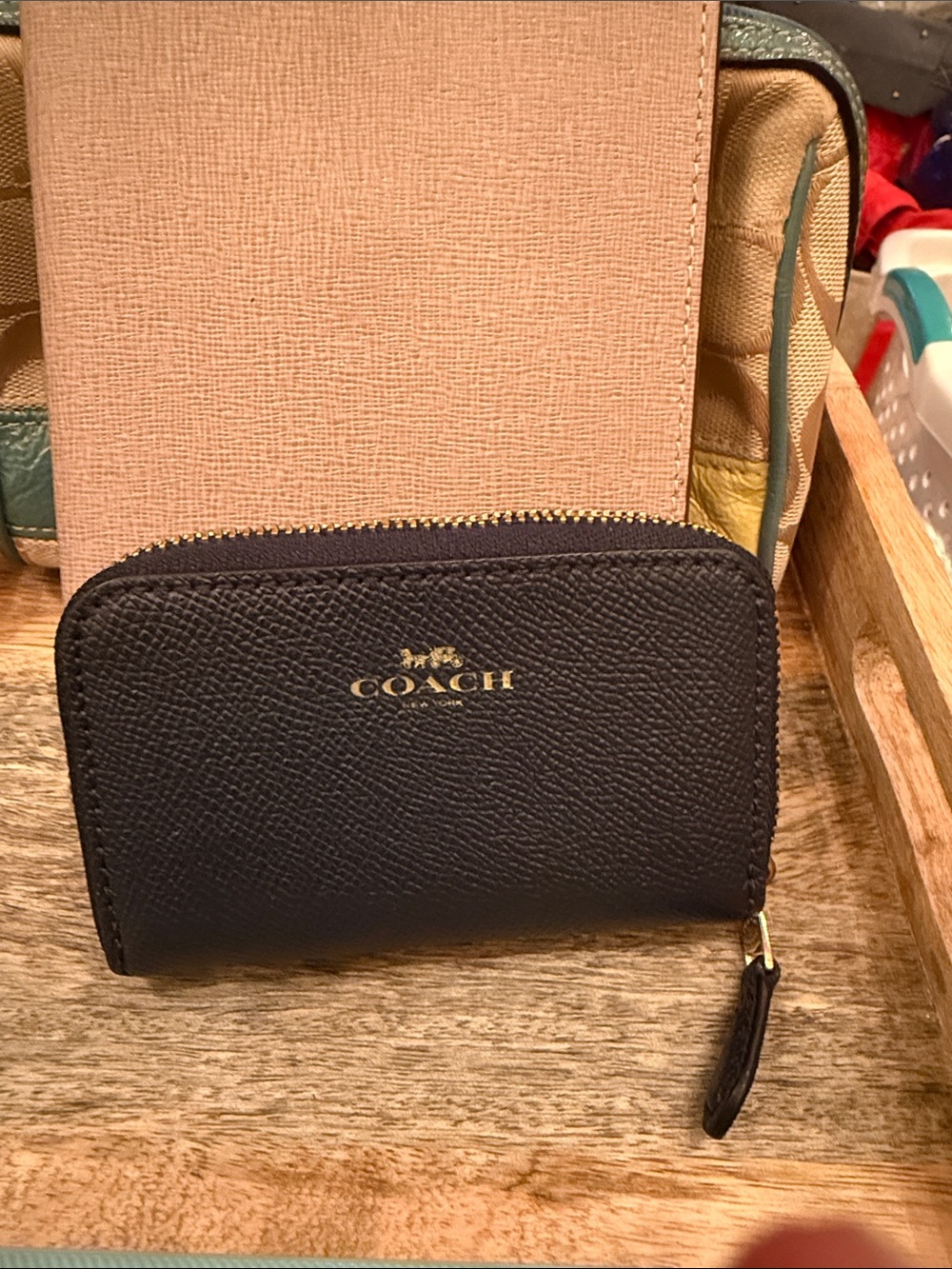 COACH Black Leather Zip Wallet with Gold Logo